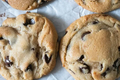 Chocolate chip cookies on baking paper